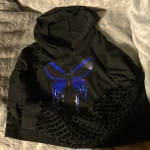 This is a medium lace sleeved crop top with a hood